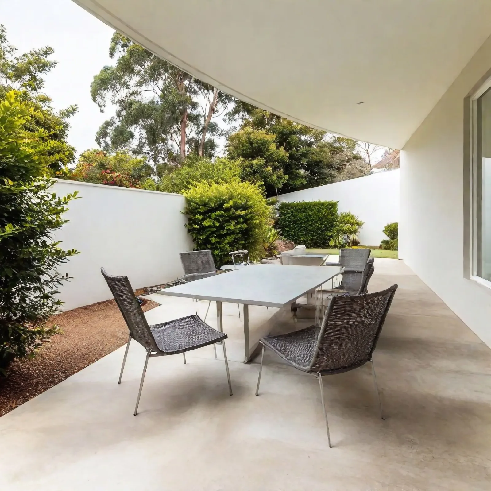 Concrete patio set up for outdoor dining