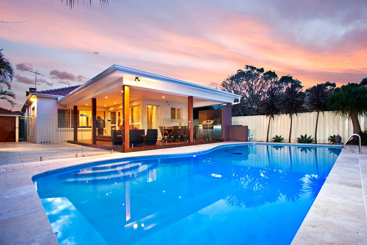 Concrete pool surround finished for evening entertaining