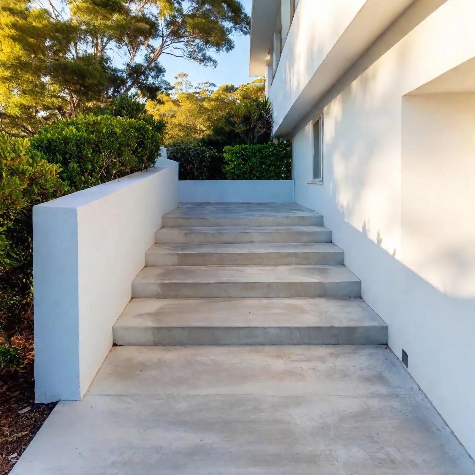 Floating concrete garden steps with built-in lighting